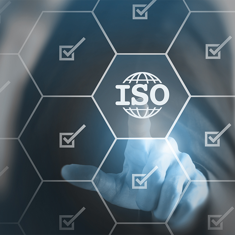 A man pointing at a holographic ISO Symbol