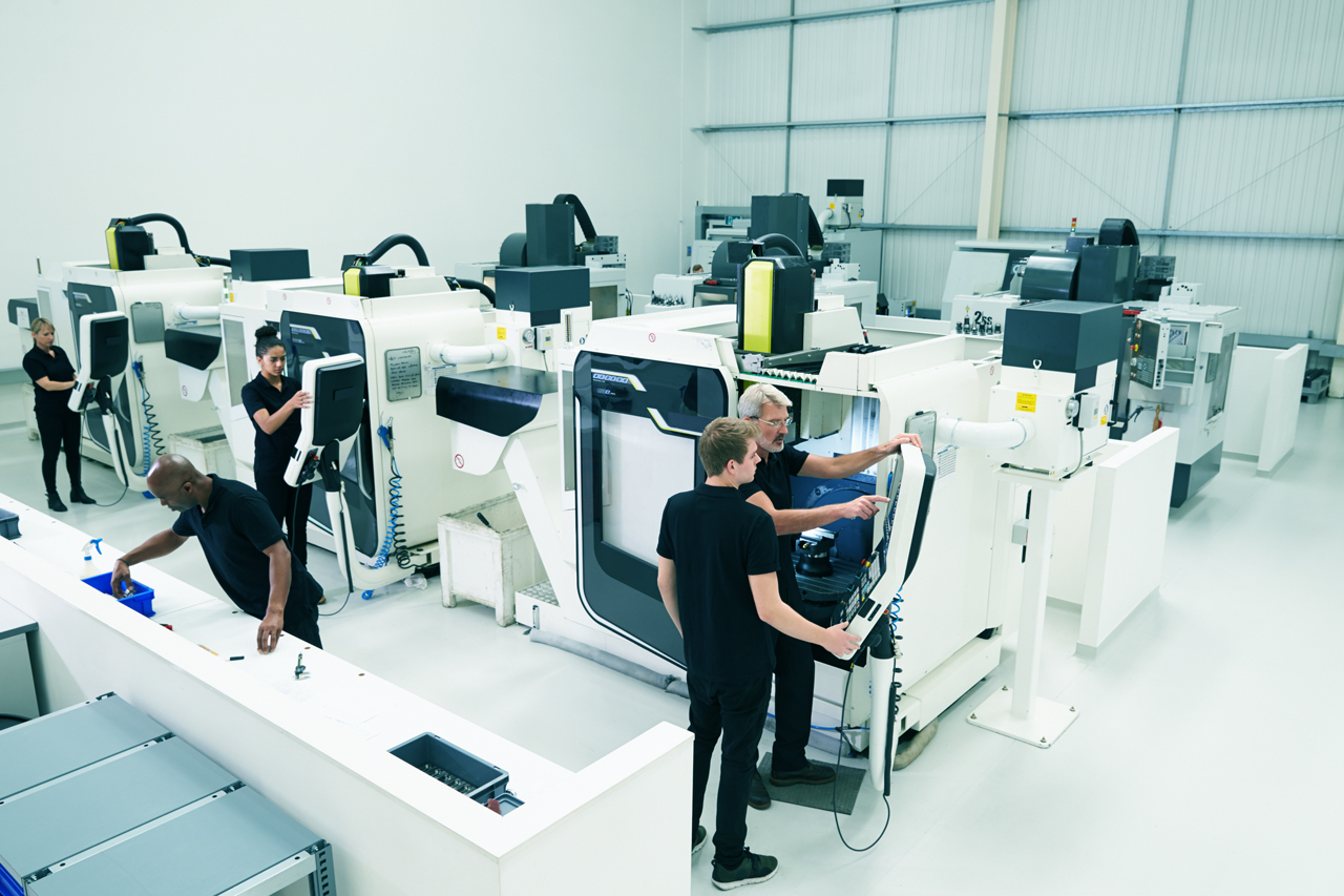 A photo showing a hall filled with machines, that are beeing calibrated